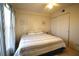 Bedroom featuring a ceiling fan, neutral color palette, and sliding door closet at 1806 Mariner Dr # 214, Tarpon Springs, FL 34689