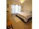Bedroom featuring a ceiling fan, natural light, and neutral color palette at 1806 Mariner Dr # 214, Tarpon Springs, FL 34689