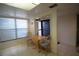 Well-lit dining area with breakfast nook near entry door and window at 1806 Mariner Dr # 214, Tarpon Springs, FL 34689