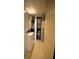 Laundry area with a stacked washer and dryer at 1806 Mariner Dr # 214, Tarpon Springs, FL 34689
