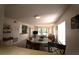 Open-concept living room, dining, and kitchen area with ample natural light and comfortable furnishings at 1806 Mariner Dr # 214, Tarpon Springs, FL 34689