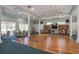Spacious recreation room complete with dance floor, tables, and library at 1806 Mariner Dr # 214, Tarpon Springs, FL 34689