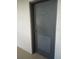 View of trash room door at 1806 Mariner Dr # 214, Tarpon Springs, FL 34689