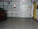 Attached garage with epoxy flooring at 1857 Bough Ave # C, Clearwater, FL 33760