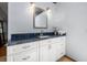 Modern bathroom with granite countertop and white cabinets at 9660 90Th Ave, Seminole, FL 33777