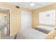 Bright bedroom with two twin beds and built-in closet at 108 11Th Ave, St Pete Beach, FL 33706