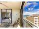 Balcony with patio furniture and breathtaking ocean view at 1380 Gulf Blvd # 1008, Clearwater Beach, FL 33767