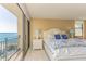 Bedroom with water views and a king-size bed at 1380 Gulf Blvd # 1008, Clearwater Beach, FL 33767