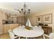 Round dining table with seating for four in a condo at 1380 Gulf Blvd # 1008, Clearwater Beach, FL 33767