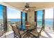 Outdoor patio with table and chairs, offering water views at 1380 Gulf Blvd # 1008, Clearwater Beach, FL 33767