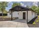 Covered carport with a modern design and ample parking at 7414 Van Dyke Rd, Odessa, FL 33556