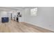 Modern kitchen with white cabinets and stainless steel appliances at 7414 Van Dyke Rd, Odessa, FL 33556