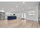 Spacious living room with hardwood floors and ample natural light at 7414 Van Dyke Rd, Odessa, FL 33556