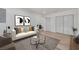 Light-filled living room features a comfortable sofa and stylish coffee table at 7414 Van Dyke Rd, Odessa, FL 33556