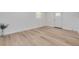 Bright and airy living room with light wood floors at 7414 Van Dyke Rd, Odessa, FL 33556