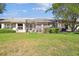 Screened patio with spacious backyard and lush landscaping at 18602 Bent Pine Dr, Hudson, FL 34667