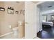 Small bathroom with toilet and half-wall sink at 18602 Bent Pine Dr, Hudson, FL 34667