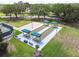 Community bocce ball courts with shaded seating areas at 18602 Bent Pine Dr, Hudson, FL 34667