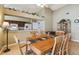 Bright dining room featuring a wooden table and chairs at 18602 Bent Pine Dr, Hudson, FL 34667