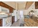 Kitchen boasts granite countertops and wood cabinets at 18602 Bent Pine Dr, Hudson, FL 34667