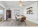 Dining area with vintage table and chairs, and built-in shelving at 5396 Acacia N Trl, Pinellas Park, FL 33782