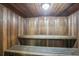 Relax in this wood-paneled sauna with built-in benches at 5396 Acacia N Trl, Pinellas Park, FL 33782