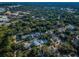 Aerial view showing home's location in a tree-lined neighborhood near the water at 335 Tucker St, Safety Harbor, FL 34695