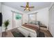 Serene bedroom with a queen-size bed and wood-look flooring at 335 Tucker St, Safety Harbor, FL 34695