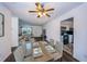 Dining area with wood table and view into living room at 335 Tucker St, Safety Harbor, FL 34695