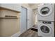 Laundry room with stackable washer and dryer, and extra storage at 335 Tucker St, Safety Harbor, FL 34695