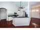 Bright kitchen featuring white cabinetry, stainless steel appliances, and granite countertops at 1032 Rosetree Ln, Tarpon Springs, FL 34689