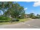 House with a spacious yard and mature landscaping at 10073 S Yacht Club Dr, Treasure Island, FL 33706