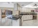 Updated kitchen featuring granite countertops and stainless steel appliances at 10073 S Yacht Club Dr, Treasure Island, FL 33706
