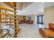 Open living area showcasing a spiral staircase and modern decor at 10073 S Yacht Club Dr, Treasure Island, FL 33706