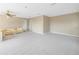 Bright living room with carpet and lots of natural light at 10073 S Yacht Club Dr, Treasure Island, FL 33706