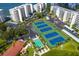 Community tennis courts and shuffleboard, near the building at 8001 Sailboat Key S Blvd # 204, St Pete Beach, FL 33707