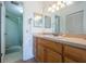 Bathroom features a vanity, shower, and tiled floor at 6268 Palma Del Mar S Blvd # 406, St Petersburg, FL 33715