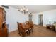 Bright dining area with wooden table and chairs at 6268 Palma Del Mar S Blvd # 406, St Petersburg, FL 33715