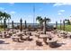 Outdoor BBQ area with ample seating and umbrellas at 830 S Gulfview Blvd # 102, Clearwater, FL 33767