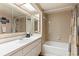 Clean bathroom with a shower/tub combo and updated vanity at 830 S Gulfview Blvd # 102, Clearwater, FL 33767