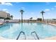 Relaxing circular pool with water access and lounge chairs at 830 S Gulfview Blvd # 102, Clearwater, FL 33767