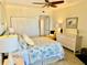 Bright bedroom with a double bed and ample closet space at 1460 Gulf Blvd # 1212, Clearwater Beach, FL 33767