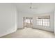 Bedroom with sliding glass doors and window at 3051 Overlook Pl, Clearwater, FL 33760