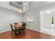 Dining room with wood table and staircase at 3051 Overlook Pl, Clearwater, FL 33760