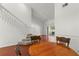 Dining area with wood table and staircase at 3051 Overlook Pl, Clearwater, FL 33760