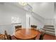 Dining area with wood table and staircase at 3051 Overlook Pl, Clearwater, FL 33760