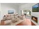 Living room with fireplace and sliding glass doors at 3051 Overlook Pl, Clearwater, FL 33760