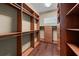 Large walk-in closet with ample shelving and drawers at 4995 Quill Ct, Palm Harbor, FL 34685