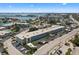 This is a stunning aerial view of the property, highlighting its location near the water and city, with ample parking at 6201 2Nd E St # 73, St Pete Beach, FL 33706