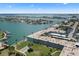 Breathtaking aerial view of waterfront community with stunning bay and boat docks at 6201 2Nd E St # 73, St Pete Beach, FL 33706